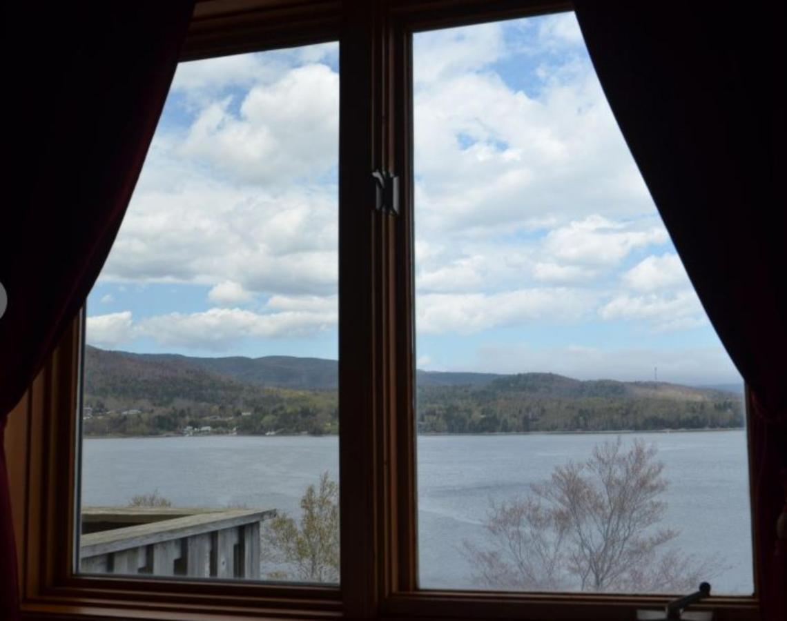 Knotty Pine Cottages, Suites & Motel Rooms Ingonish Exteriör bild